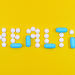 white-and-blue-health-pill-and-tablet-letter-cutout-on-806427